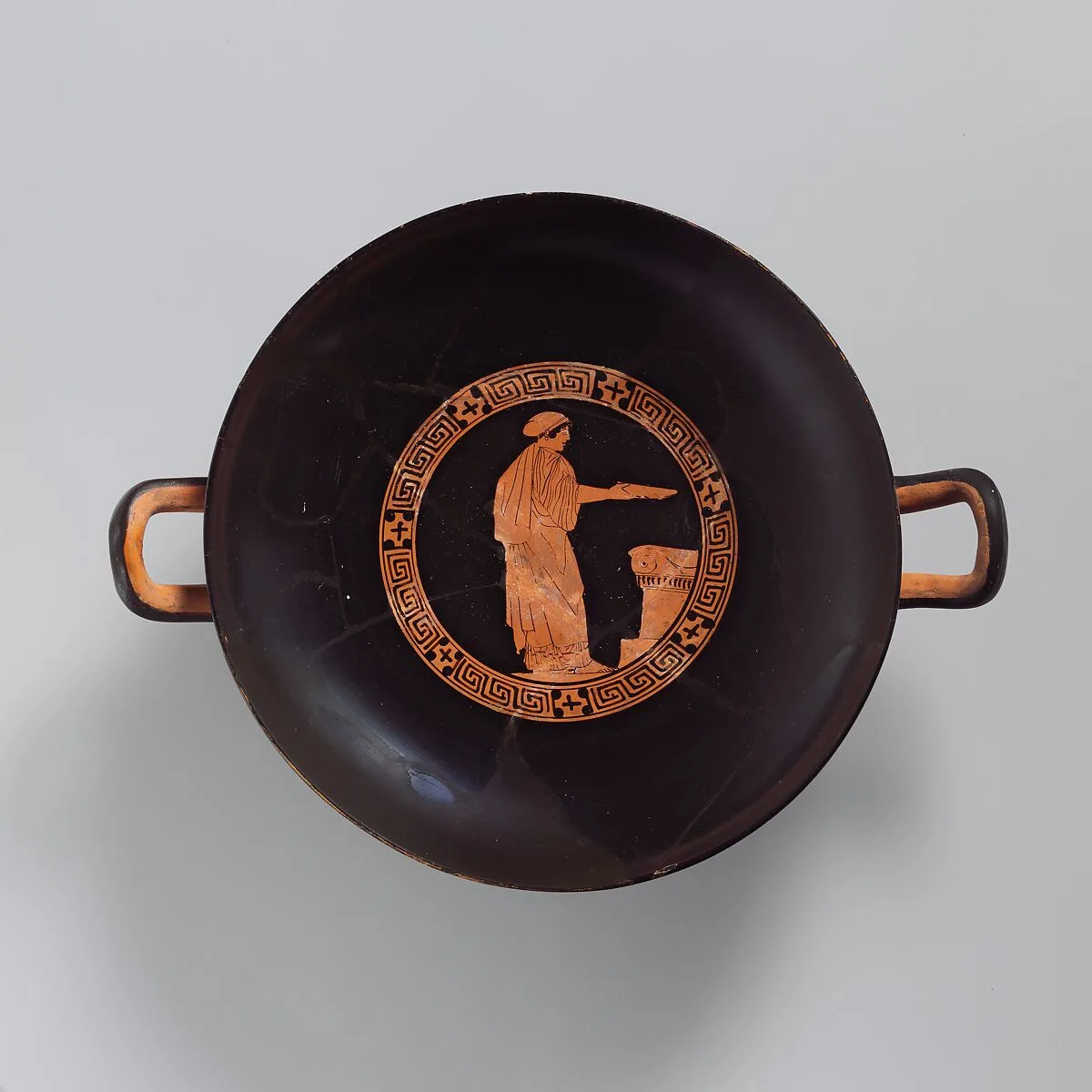 Terracotta kylix (drinking cup) — Painter of London E 100