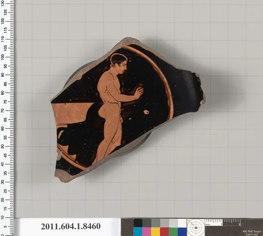 Terracotta fragment of a stemless kylix (drinking cup)