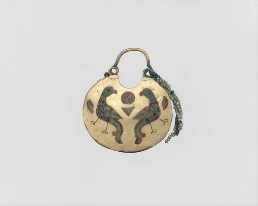 One of a Pair of Temple Pendants, with Confronted Birds (front) and Human Heads (back)