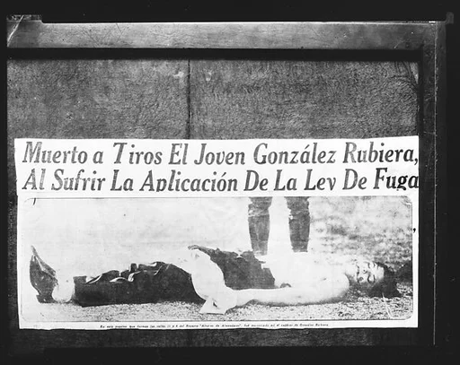 [Copy of Newspaper File Clipping: Photograph of Dead Body with Caption: "Muerto a Tiros...", Havana]