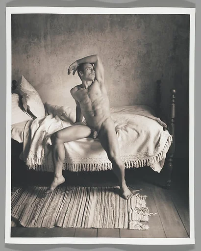 [Male Nude with Raised Arm on Bed]