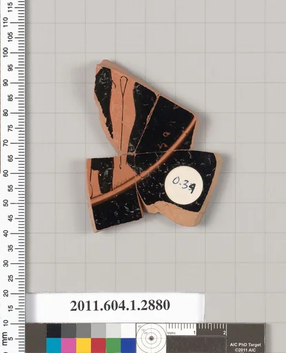 Terracotta fragment of a kylix (drinking cup)