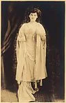 [Woman, Standing, in Evening Dress and Cloak]
