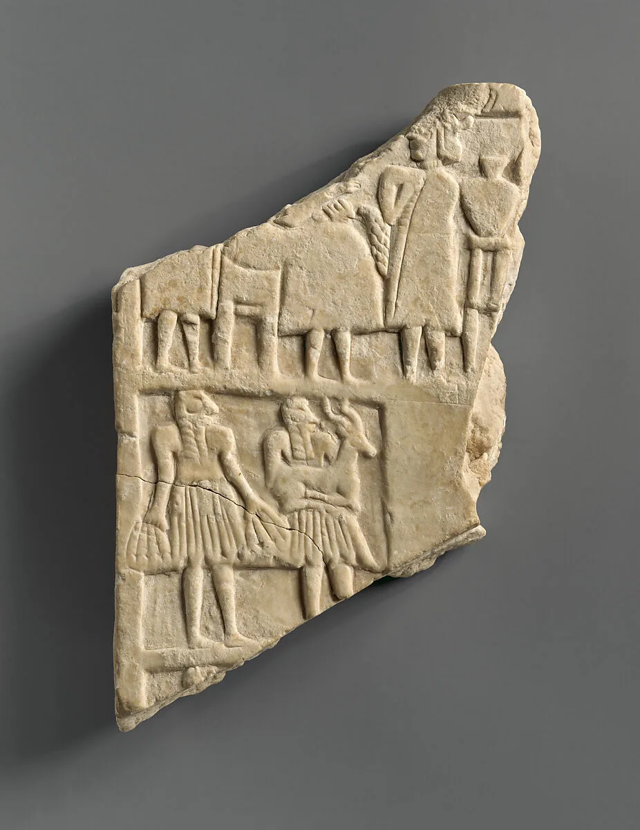 Plaque with a banquet scene — Unknown