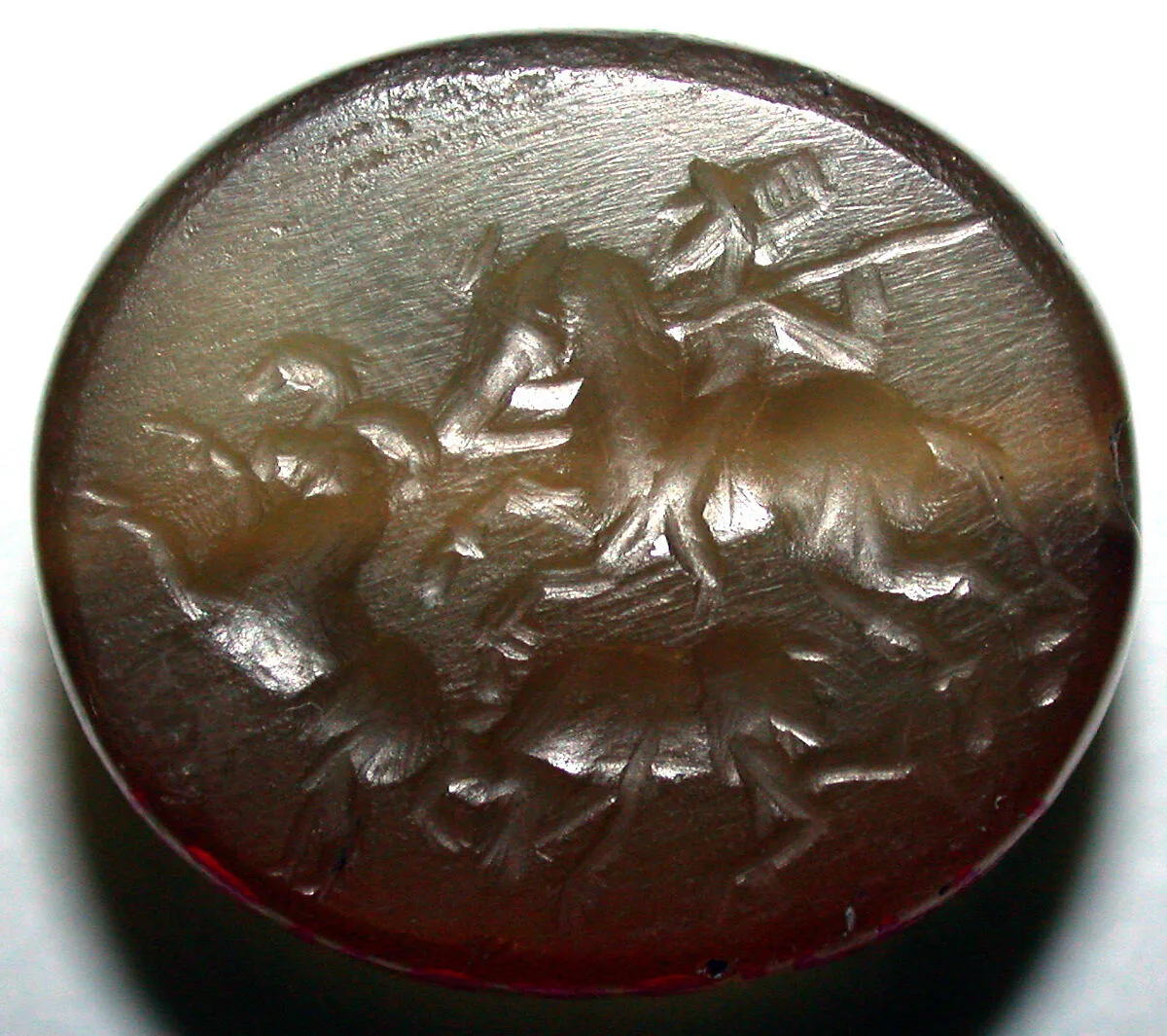 Stamp seal and modern impression: hunter on horse attacking rams — Unknown