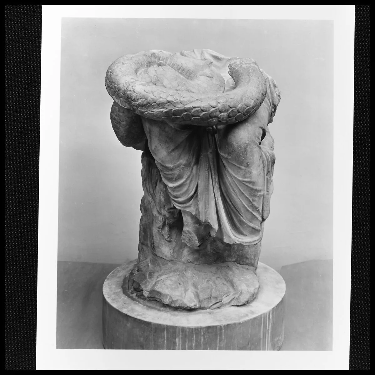 Lower part of a marble seated statue of Hygieia — Unknown