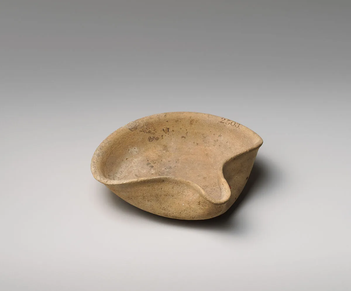 Terracotta saucer-shaped lamp — Unknown