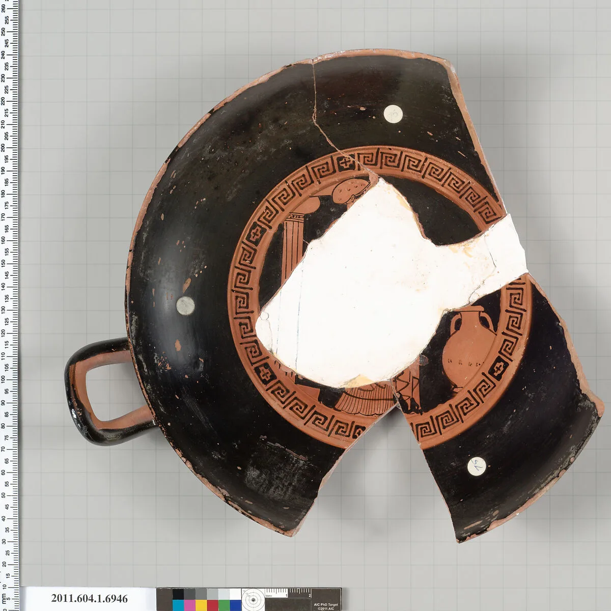 Terracotta fragment of a kylix (drinking cup) — Painter of Munich 2676