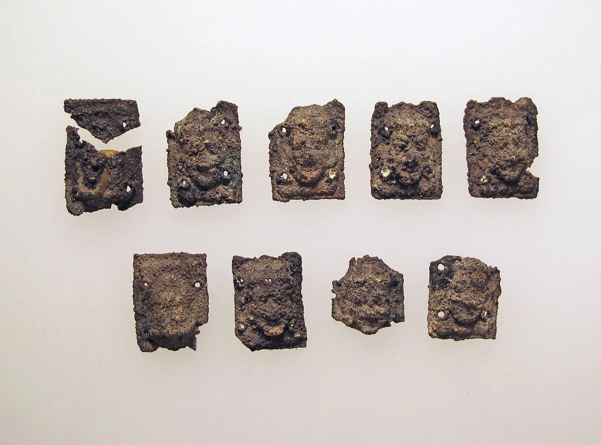 Beads with female head — Unknown