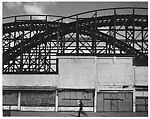 [View of Rollercoaster Behind Booths, Coney Island]
