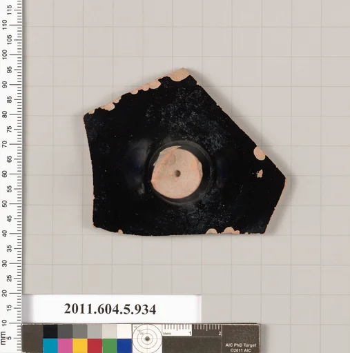 Terracotta fragment of a kylix (drinking cup)