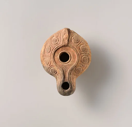 Terracotta oil lamp