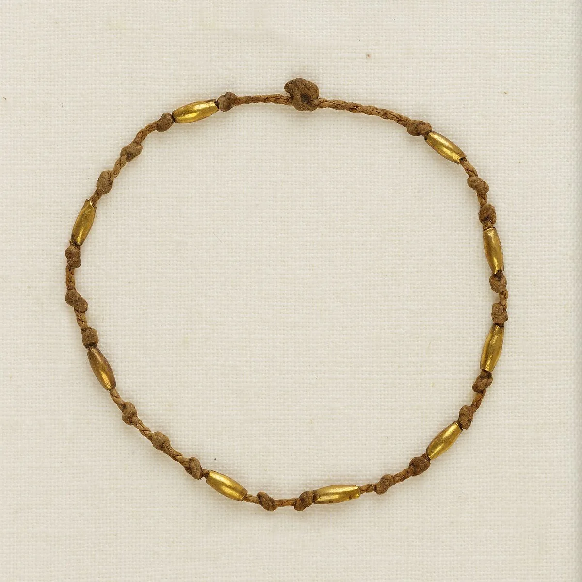 Bracelet with knots and barrel beads — Unknown