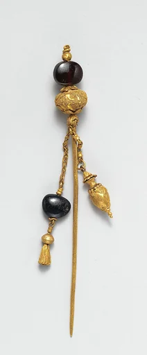 Gold and garnet pin