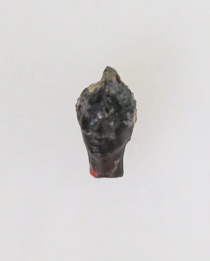 Glass pendant in the form of a Black African's head