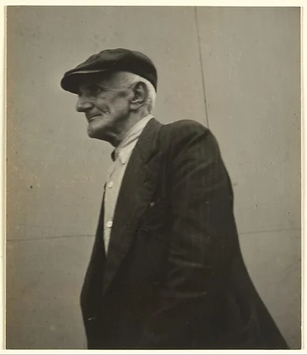 [Male Pedestrian in Cap and Dark Jacket, Detroit (for Fortune Magazine Article "Labor Anonymous")]