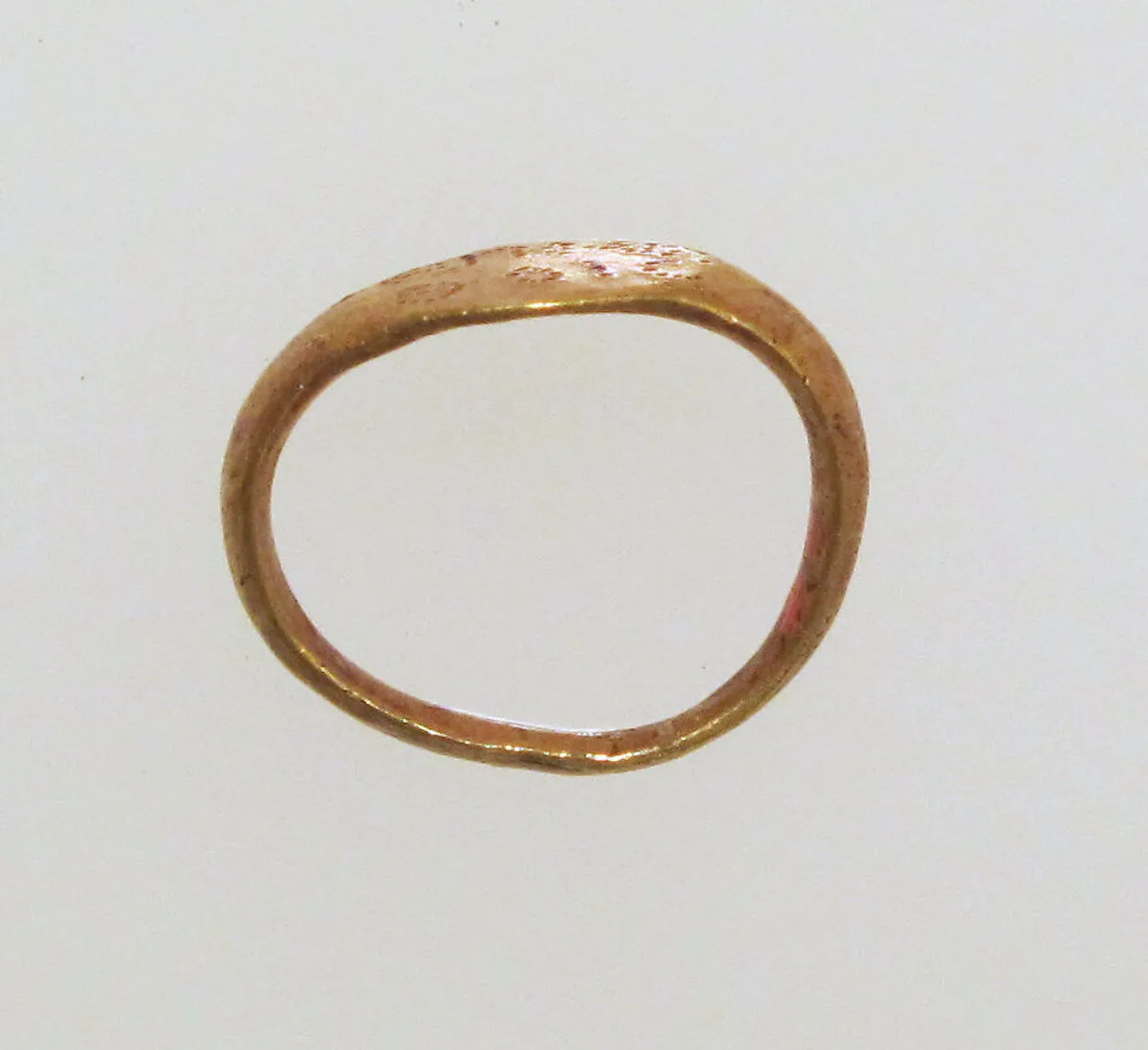 Gold ring with inscribed bezel — Unknown
