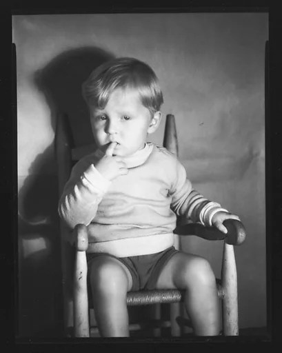 [Baby in High Chair]