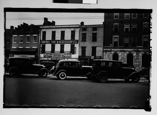 [Main Street Buildings with Parked Cars in Foreground, Augusta, Georgia]