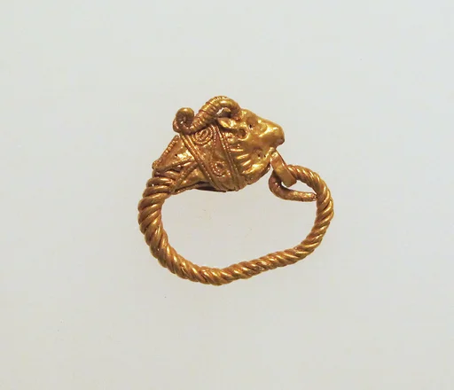 Gold earring with head of a goat