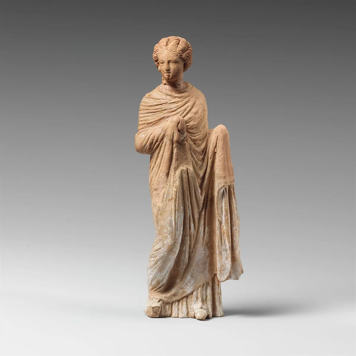 Terracotta statuette of a draped woman — Unknown