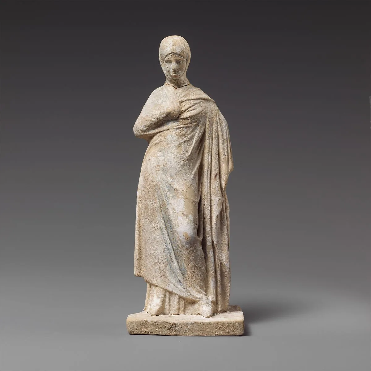 Terracotta statuette of a draped woman — Unknown