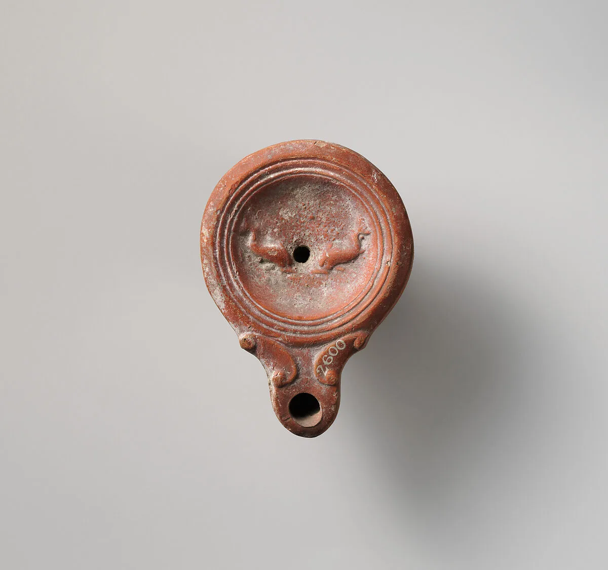 Terracotta oil lamp — Unknown
