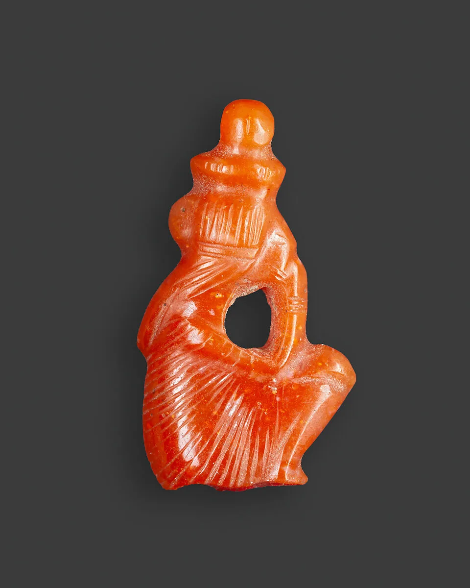 Amulet of a squatting royal female child with the name Nefertari Merimut on the underside — Unknown