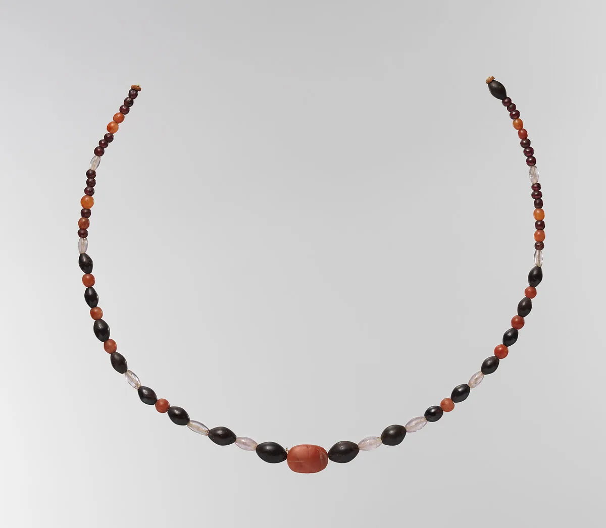 String of beads with scarab — Unknown