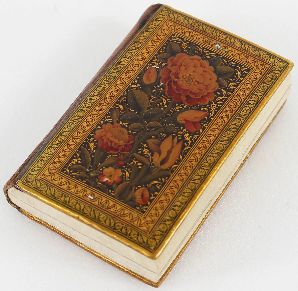 Miniature Qur'an with Lacquered Binding and Carrying Case — Unknown