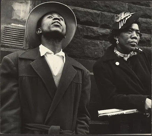 [Man and Woman Wearing Winter Coats and Hats, New York]
