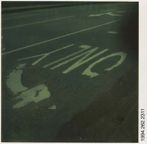 [Street Arrow, Lane Dividers, and Lettering: "ONLY"]