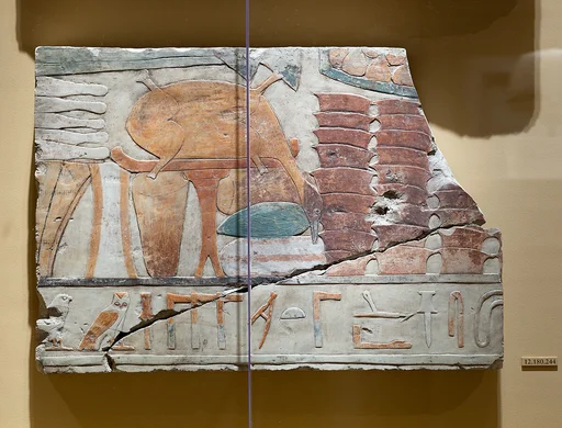 Relief depicting an offering table and part of an inscription