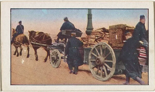 Card No. 138, Moving the Seat of Belgian Government from Antwerp to France, from the World War I Scenes series (T121) issued by Sweet Caporal Cigarettes — Underwood & Underwood|American Tobacco Company