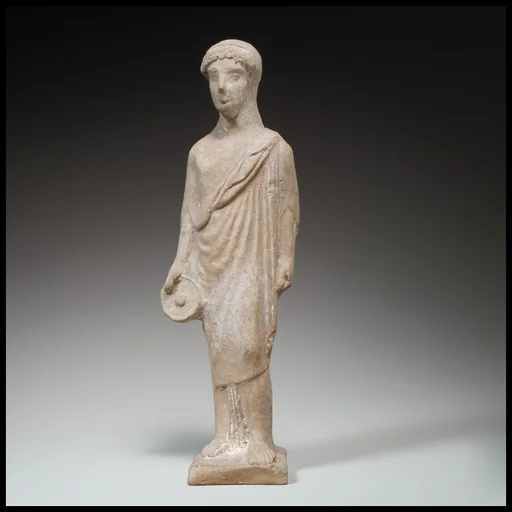 Standing female figurine