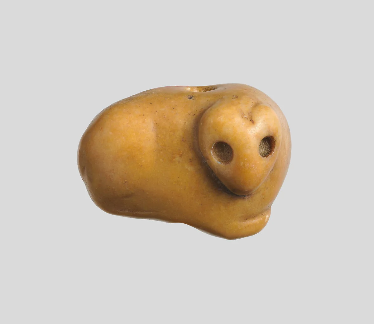 Seal amulet in the form of a recumbent fox — Unknown