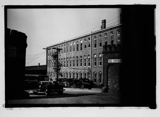 [Warehouse Building with Car Rounding Corner, From Automobile, Savannah, Georgia]