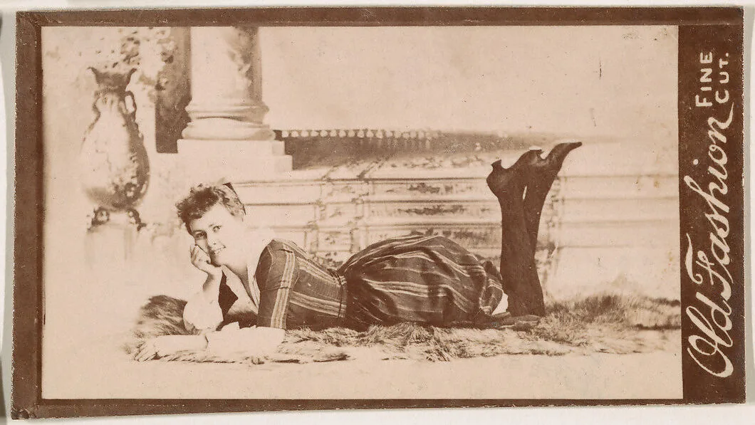 Actress on fur rug, from the Actresses series (N664) promoting Old Fashion Fine Cut Tobacco — Unknown