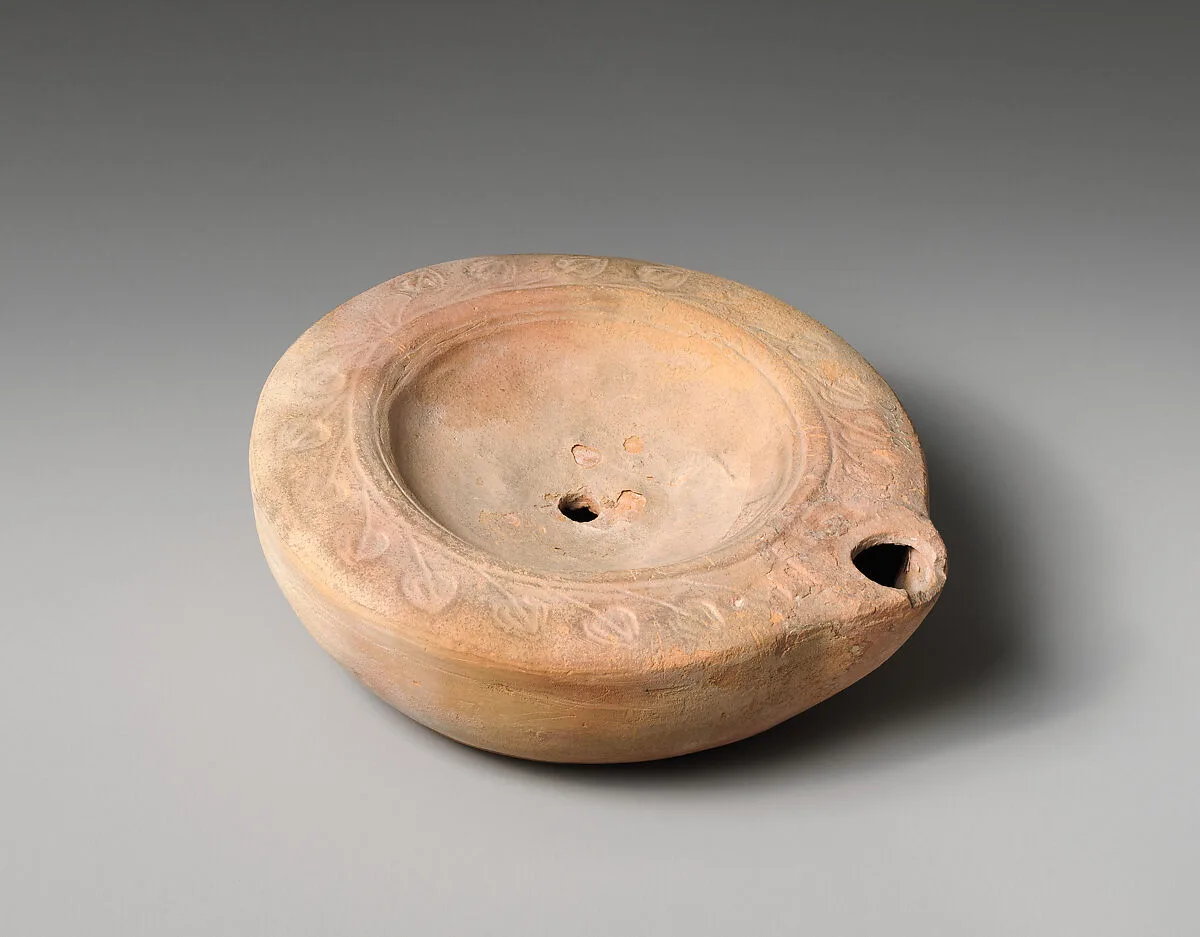 Terracotta oil lamp — Unknown