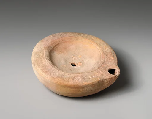 Terracotta oil lamp