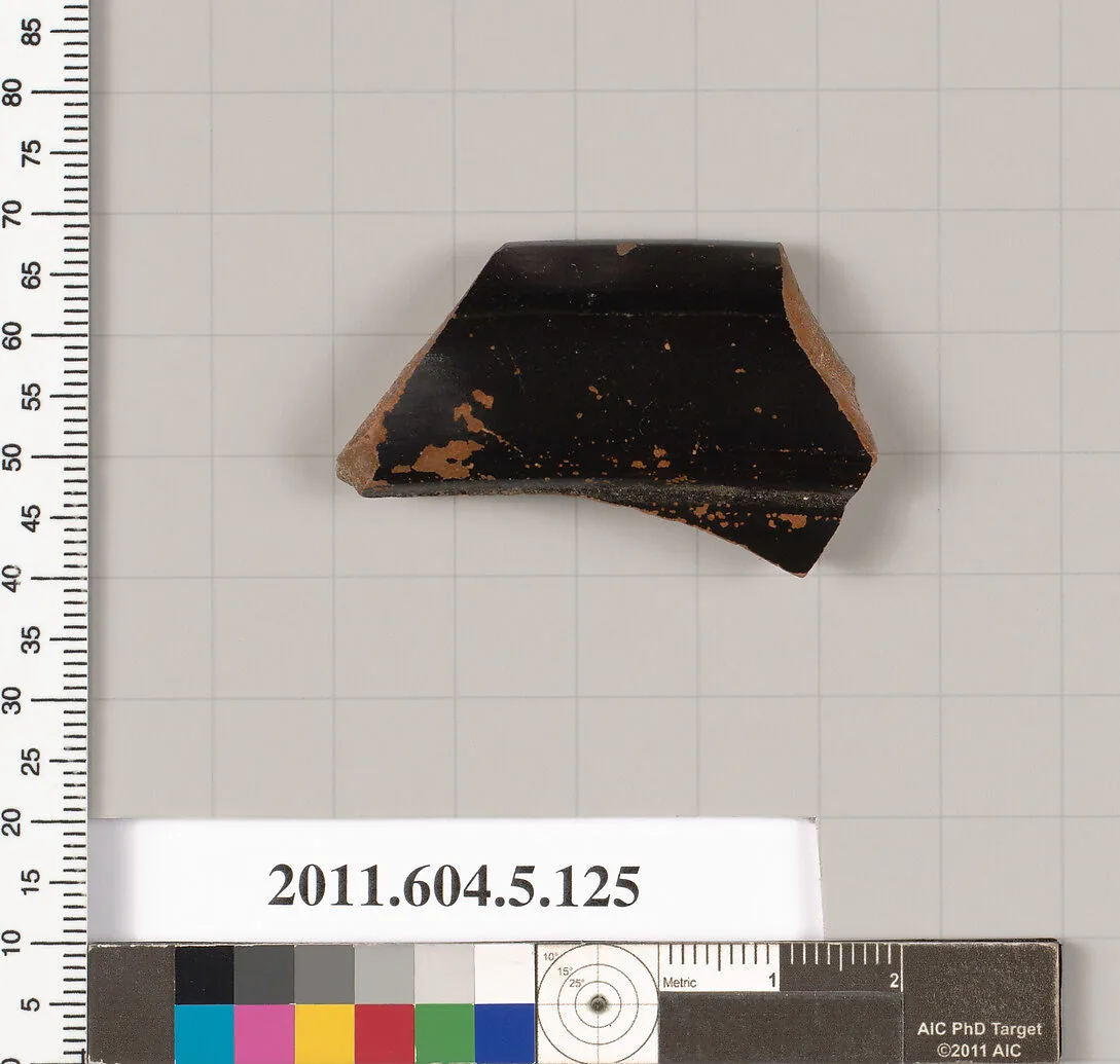 Terracotta rim fragment of a stemless kylix (drinking cup)? — Unknown