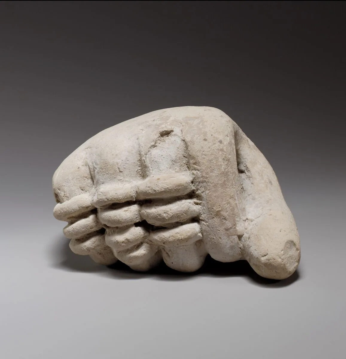 Terracotta fragment of a hand — Unknown