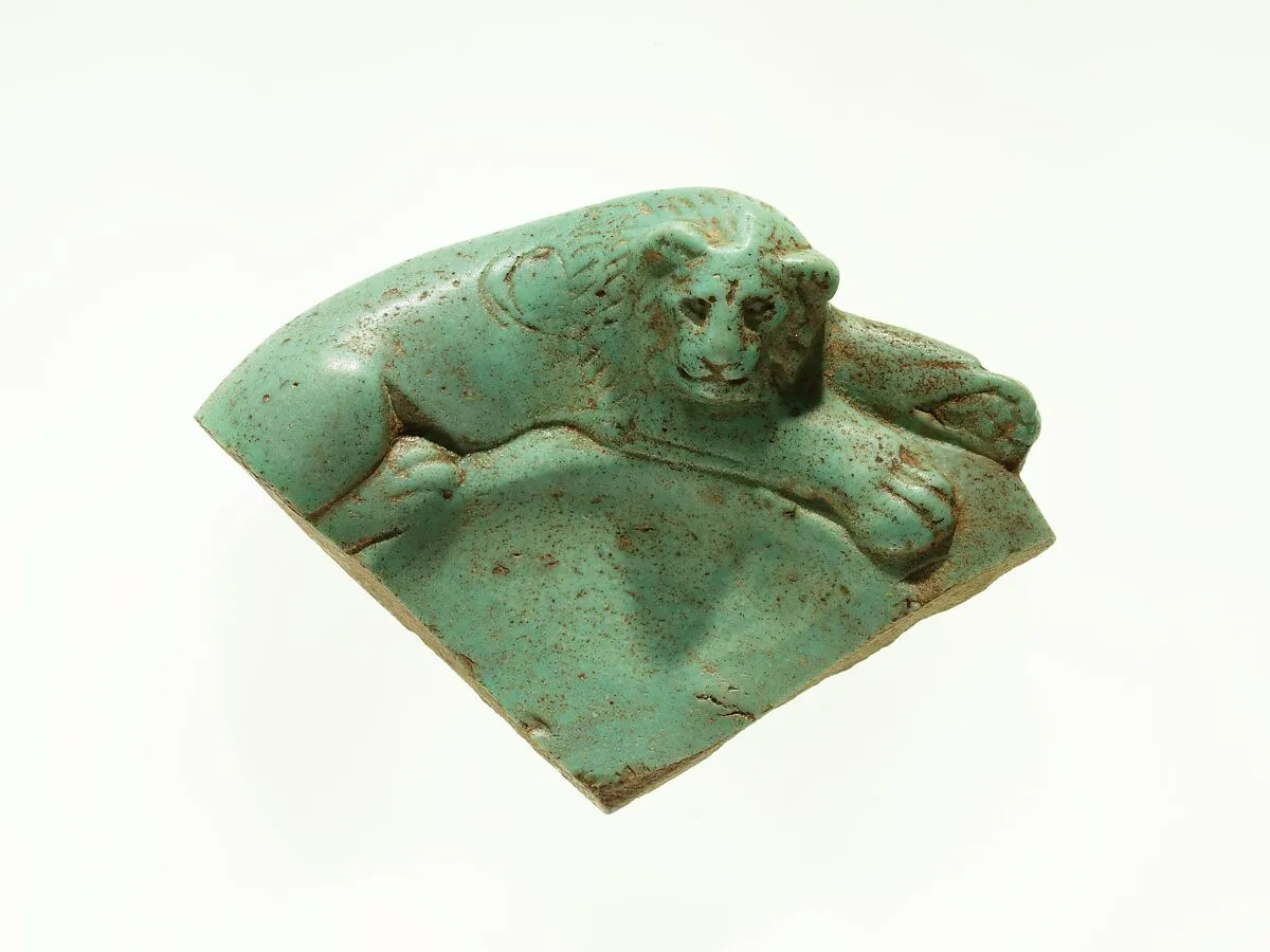 Fragment of a dish with a lion reclining on the rim — Unknown