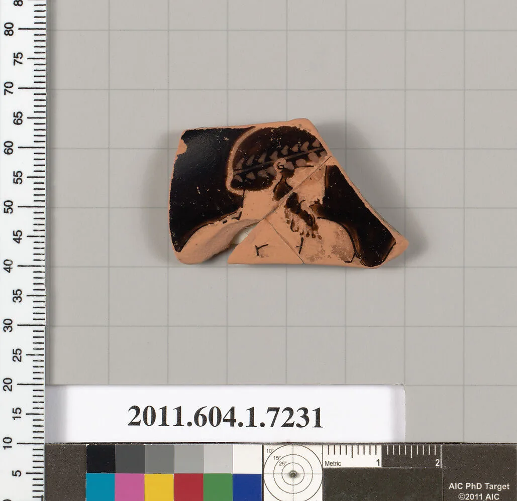 Terracotta fragment of a kylix (drinking cup) — Makron