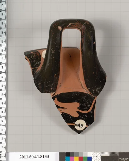 Terracotta fragment of a kylix (drinking cup)