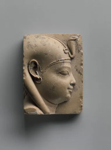 Plaque with bust of a divine child with earring (Ihy?)