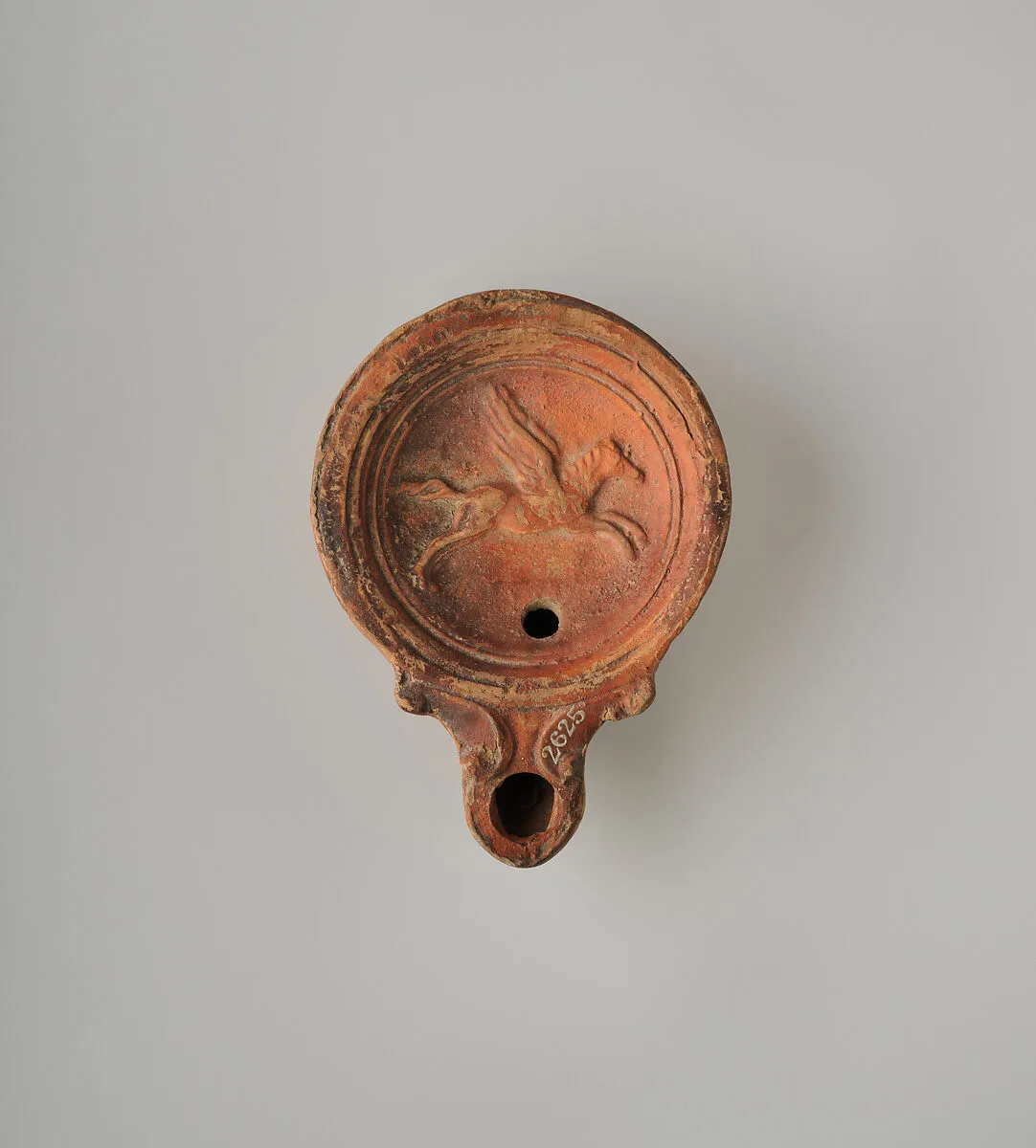 Terracotta oil lamp — Unknown