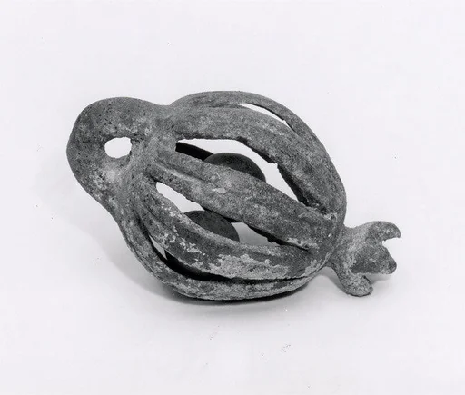 Openwork rattle bell