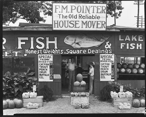 [Roadside Fish and Produce Stand with Young Men in Doorway, Near Birmingham, Alabama]