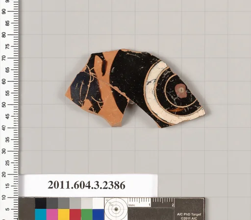 Terracotta fragment of a kylix: eye-cup (drinking cup)